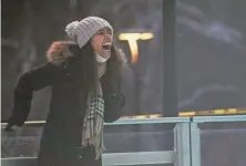  ?? LORRIE CECIL/THISWEEK ?? Alex Gonzalez laughs as she skates at the ice rink in Riverside Crossing Park.