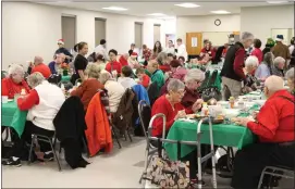  ?? PHOTO COURTESY OF SHANNON OMLOR OF ST. JOHN’S EVANGELICA­L LUTHERAN CHURCH, BOYERTOWN ?? Community members filled the Fellowship Hall at St. John’s Evangelica­l Lutheran Church in Boyertown for a free community meal on Christmas Day.