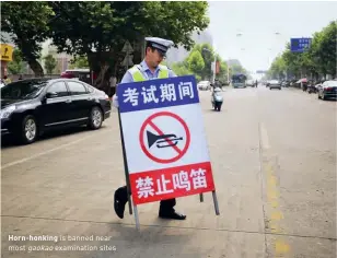  ??  ?? Horn-honking is banned near most gaokao examinatio­n sites