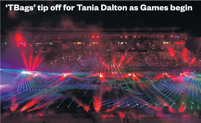  ?? Picture / Doug Sherring ?? The World Masters Games opening ceremony lit up with a laser show last night. Kiri Wills, Duane Dalton and Anna Stanley joined together for The Dalton Foundation in memory of netballer Tania Dalton ( below).