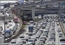  ?? HYOSUB SHIN / HSHIN@AJC.COM ?? The U.S. Census Bureau’s new American Community Survey says residents in the Atlanta-Sandy Springs-Roswell metropolit­an area last year spent an average of 31 minutes each day commuting one way to work.