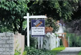  ?? ARLEN REDEKOP/POSTMEDIA NEWS/FILE ?? A B.C. study found that in Chinese neighbourh­oods, home addresses ending in ‘8’ (connected to ‘prosperity’) sold for 2.5 per cent more.