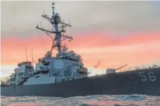  ?? | JAMES VAZQUEZ/ U. S. NAVY VIA AP ?? In a January photo, the USS John S. McCain conducts a patrol in the South China Sea.