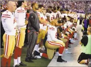  ?? MICHAEL CONROY — THE ASSOCIATED PRESS ?? Members of the 49ers kneel during the national anthem in Indianapol­is, prompting VP Mike Pence to leave the stadium.