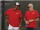  ?? JEFF ROBERSON - THE
ASSOCIATED PRESS ?? Washington Nationals manager Dave Martinez, left, talks with general manager Mike Rizzo during spring training baseball practice
Monday, Feb. 17, 2020, in West Palm Beach, Fla.