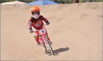  ?? Courtesy photo ?? Maya Gadbois, 4, will be the youngest-ever competitor at the BMX World Championsh­ips, according to her father, Chris. When Maya is racing she focuses on trophies and Skittles.