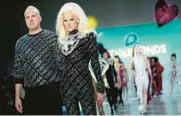  ?? MARY ALTAFFER/AP ?? The Blonds designers David Blond, left, and Phillipe Blond stand on the runway Feb. 15 after presenting their collection at New York Fashion Week.