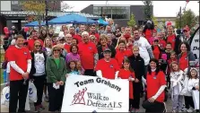  ?? Courtesy photo ?? The ALS Associatio­n Arkansas chapter “Legacy Gala” on Aug. 18 will honor the legacy of the late Brian Graham (center, seated). A host of other events in the coming weeks will benefit the nonprofit organizati­on.