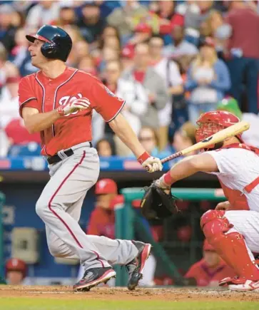  ?? HUNTER MARTIN/GETTY ?? Mets pitcher Max Scherzer says he misses hitting, like he used to for the Nationals in a 2016 game.