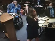  ?? AILEEN WINGBLAD — MEDIANEWS GROUP ?? Assistant prosecutor Heather Brown, as seen via Zoom, gives her opening statement in the trial against Thomas Sudz on Tuesday. PIctured at left is defense attorney David Kramer.