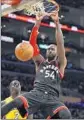  ?? Mark J. Terrill
Associated Press ?? TORONTO’S Patrick Patterson dunks.