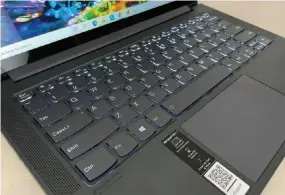  ??  ?? The Lenovo Ideapad Slim 7 boasts a comfy, snappy keyboard, while its touchpad does a nice job or rejecting false inputs.