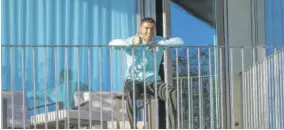  ?? (photo: Afp) ?? This handout picture released yesterday by the Portuguese Football Federation shows Portugal´s forward Cristiano Ronaldo giving the thumb up as he watches his teammates’ training session from a balcony at Portugal’s training camp in Oeiras, on the outskirts of Lisbon yesterday.