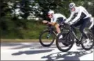  ?? PETER DEJONG — THE ASSOCIATED PRESS ?? Four-time Tour de France winner Chris Froome, right, and Luke Rowe ride during training near Saint-Mars-la-Reorthe, France, Friday ahead of Saturday’s start of the Tour de France.