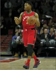  ?? MATT SLOCUM — THE ASSOCIATED PRESS ?? Villanova product Kyle Lowry is an intrinsic part of the Raptors’ attack. He scored 23 points against the Sixers.