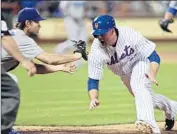  ?? Frank Franklin II Associated Press ?? CLAYTON KERSHAW, left, of the Dodgers tags out the Mets’ Lucas Duda in the eighth inning.