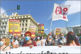  ?? Protesters march to the parliament. ??