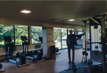  ?? COURTESY HYATT MONTEREY ?? Hyatt Monterey General Manager Kevin Ellis in the hotel’s redesigned gym.