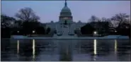  ?? THE ASSOCIATED PRESS ?? The dome of the Capitol Building is shown Friday at sunrise in Washington. The Senate is ready for a showdown debate over immigratio­n, including whether to protect young “Dreamers” from deportatio­n, in an election-year battle that’s sure to electrify...