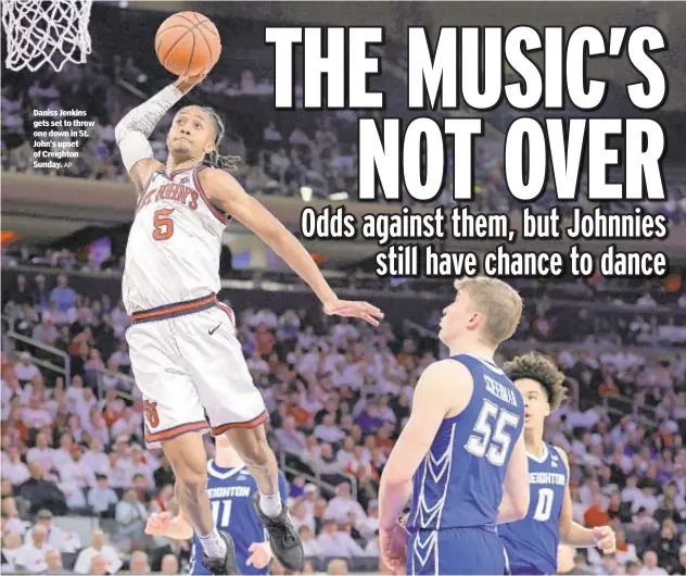  ?? AP ?? Daniss Jenkins gets set to throw one down in St. John’s upset of Creighton Sunday.