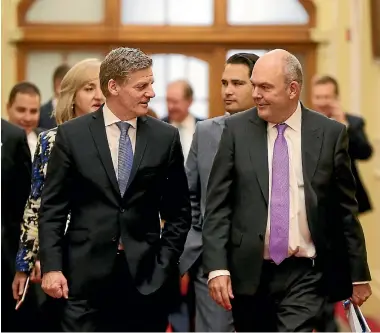  ?? PHOTO: GETTY IMAGES ?? Prime Minister Bill English and Finance Minister Steven Joyce make their way to the 2017 budget presentati­on at Parliament.
