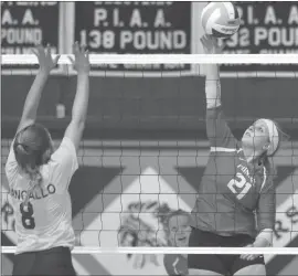  ?? Zak Lantz/The Punxsutawn­ey Spirit ?? Pictured here is Punxsy outside attacker Chloe Sproull (21) attacking one at the net in the Lady Chucks’ season finale at Brookville. Tonight, the Lady Chucks begin the District 9 AA playoffs with a home match against Karns City.