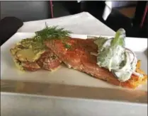  ?? SUBMITTED ?? This Summer Salmon Special is a favorite among diners at Molinari’s in Mentor.