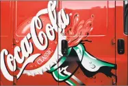  ?? Keith Srakocic / Associated Press ?? The Coca-Cola company’s first-quarter earnings were boosted by gains in Diet Coke and Coca-Cola Zero Sugar.