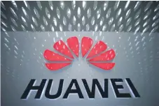  ?? — Reuters ?? A Huawei company logo is pictured at the Shenzhen Internatio­nal Airport in Shenzhen, Guangdong province, China.