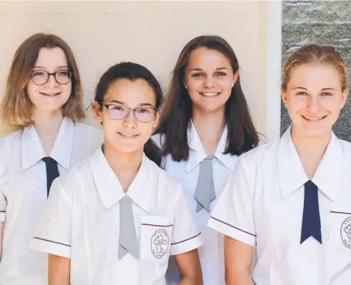  ??  ?? EXCHANGE STUDENTS: At St Monica’s College (from left) Laura Martin, Caroline Marteau and Appoline Claude, all from France, with Alessia Castelli from Switzerlan­d.