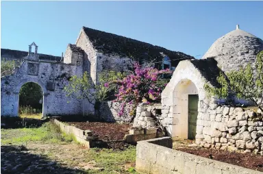  ?? CAIN BURDEAU VIA AP ?? This abandoned trullo and farm is in Valle d’Itria, a quiet region of rolling green hills, meandering country roads, endless stone walls, cone-roofed country cottages, rock-solid peasants and earthy food and wine in Puglia, Italy.