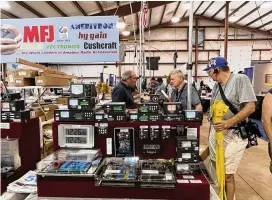  ?? AIMEE HANCOCK/STAFF ?? Dayton Hamvention celebrated 70 years of its gathering of amateur radio enthusiast­s this weekend at the Greene County Fairground­s following a two-year hiatus because of the COVID-19 pandemic.