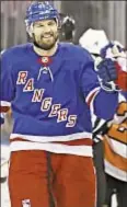  ?? GETTY ?? Rick Nash celebrates first of his two goals, snapping scoring slump in rout of Flyers at Garden.