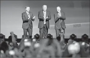  ?? AP/MIKE STEWART ?? President Donald Trump stands with National Rifle Associatio­n Executive Vice President Wayne LaPierre (right) and Chris Cox, an NRA executive, as he arrives at the NRA convention Friday in Atlanta.