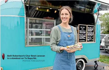  ?? PHOTOS: TOM LEE/STUFF ?? Beth Robertson’s Chur Bowl caravan is a standout on Te Rapa Rd.