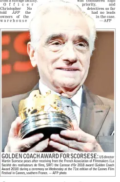  ?? — AFP photo ?? US director Martin Scorsese poses after receiving from the French Associatio­n of Filmmakers (La Société des realisateu­rs de films, SRF) the Carosse d’Or 2018 award (Golden Coach Award 2018) during a ceremony on Wednesday at the 71st edition of the...