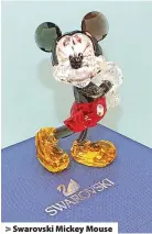  ??  ?? > Swarovski Mickey Mouse