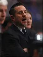  ??  ?? Bob Boughner stands behind the bench during his first game as Sharks interim coach.