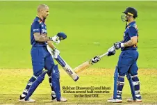  ??  ?? Shikhar Dhawan (L) and Ishan Kishan scored half-centuries in the first ODI