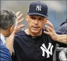  ?? KATHY WILLENS / ASSOCIATED PRESS ?? Manager Joe Girardi isn’t certain he’ll be back for an 11th year managing the Yankees.