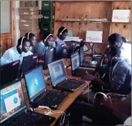  ??  ?? Luwinga Secondary School pupils in Malawi use the PCS