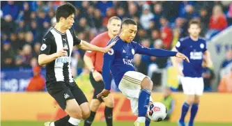  ?? AFP-Yonhap ?? Newcastle United’s South Korean midfielder Ki Sung-yueng, left, vies with Leicester City’s Belgian midfielder Youri Tielemans, second from right, during the English Premier League football match between Leicester City and Newcastle United in Leicester, central England, on Sunday.