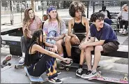  ??  ?? Skate Kitchen is writer-director Crystal Moselle’s film about a real group of young women who skateboard in lower Manhattan. Pictured are (from left) writer-director Moselle, Rachelle Vinberg, Nina Moran, Ardelia Lovelace and Ajani Russell.