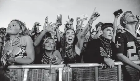  ?? Associated Press file photo ?? Festivalgo­ers in 2017 attend the Voodoo Music and Art Experience in New Orleans. Facial recognitio­n technology is not coming any time soon to the festival, nor to many others, including South by Southwest.