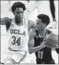  ?? Ashley Landis Associated Press ?? UCLA’S David Singleton guards Arizona State’s Alonzo Verge Jr.