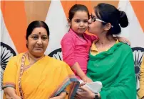  ?? PTI ?? Uzma and her daughter with Sushma Swaraj at Jawahar Bhawan in New Delhi on Thursday. —