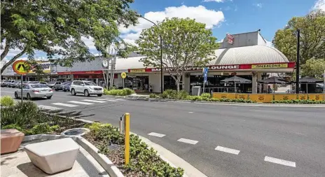  ?? Photos: John
Wilson Photograph­y ?? FOR SALE: Two Roma CBD properties owned by the Garvie family will go under the hammer next week through Burgess Rawson.