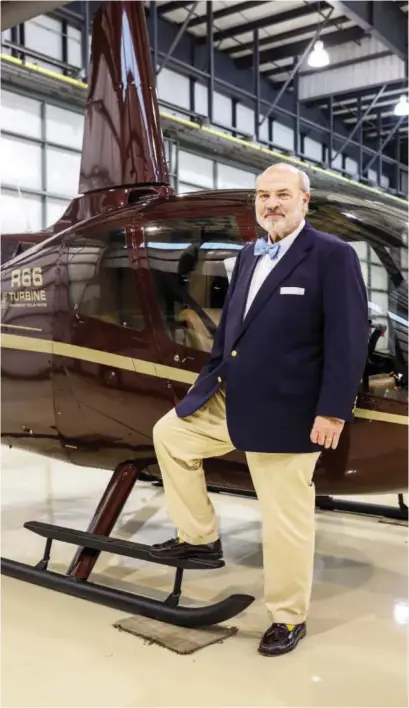  ?? ?? Allan Jones with his helicopter at his Cleveland, Tennessee, home.