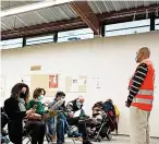  ?? ?? People wait during an observatio­n period after having received Pfizer’s Covid-19 vaccine at a vaccinatio­n site, in Fontainebl­eau, south of Paris