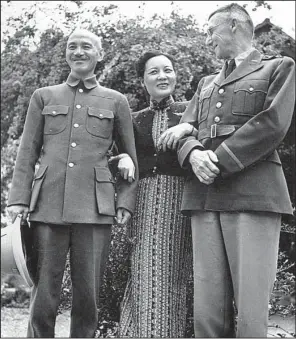  ?? AP file photo ?? General Chiang Kai-Shek and his wife, Madam Chiang Kai-Shek, pose with Gen. Joseph W. Stilwell during a 1942 conference in Burma. Stilwell had a low regard for Chiang, and Chiang loathed Stilwell and worked to undermine him, historians say.